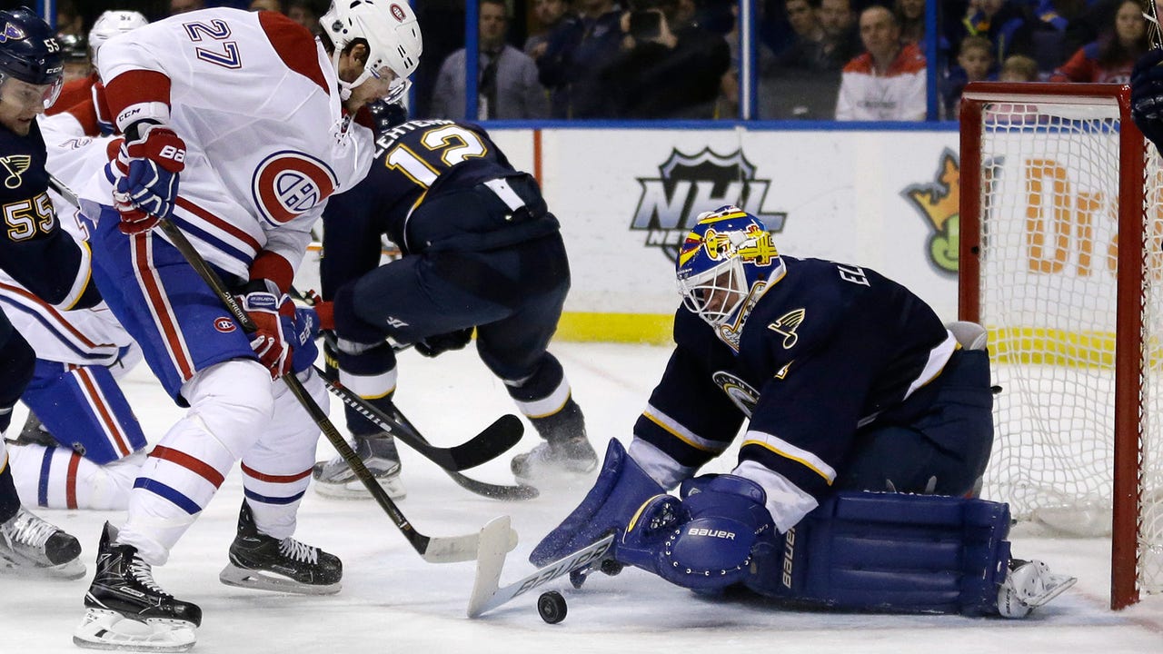 Elliott has 46 saves in Blues' 4-3 OT win on Goalie Heritage Night